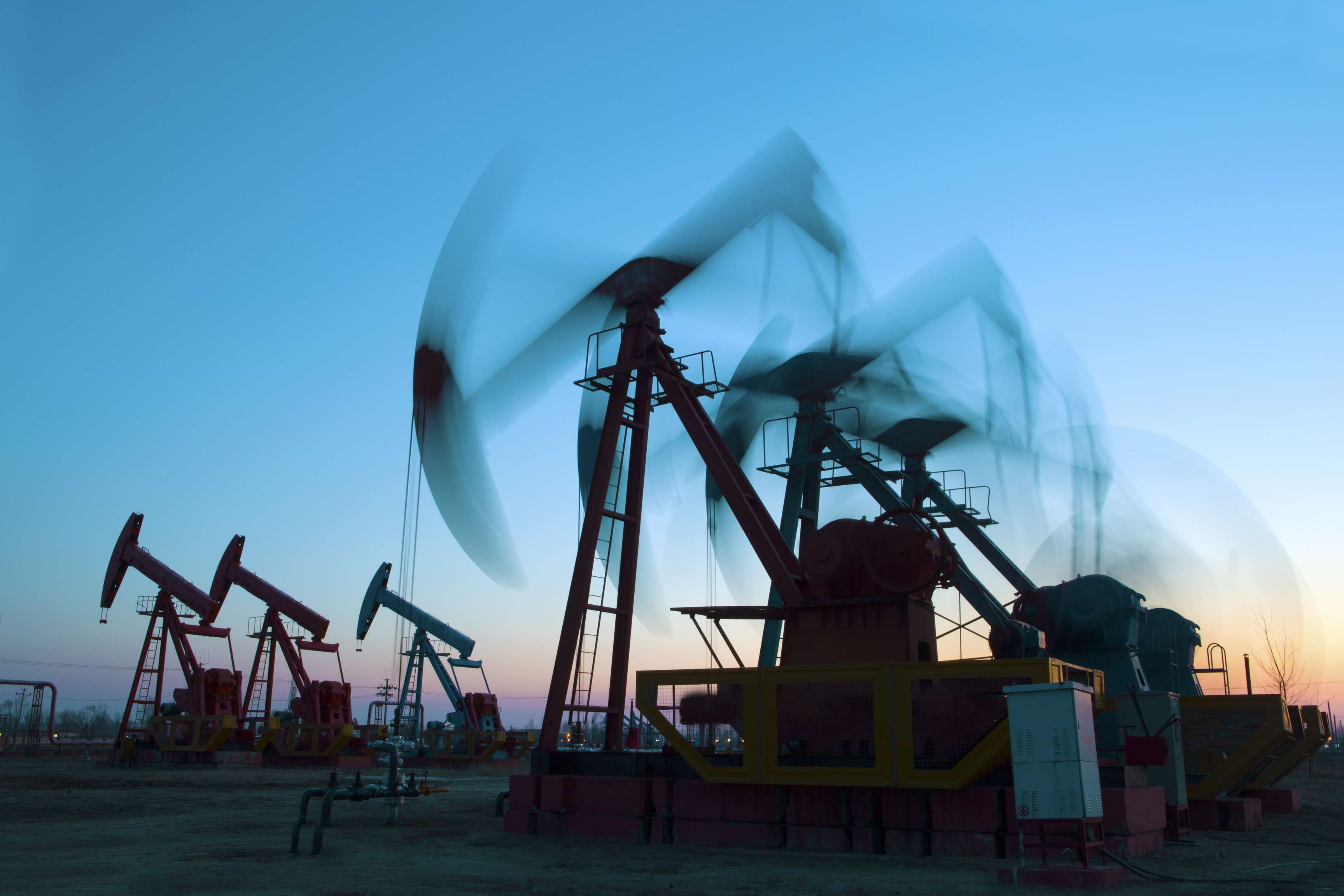 Rosenxt - Field with oil rig pumps