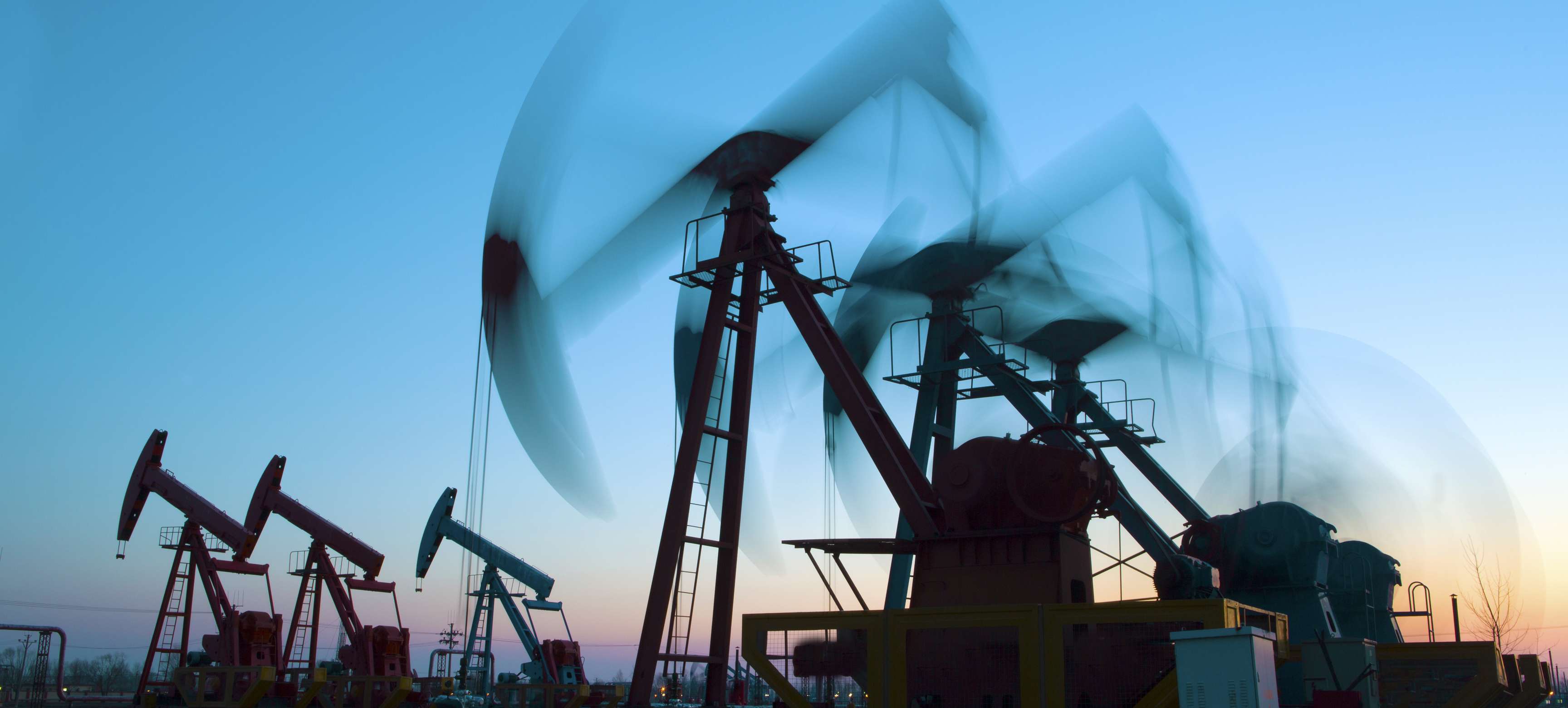 Rosenxt - Field with oil rig pumps
